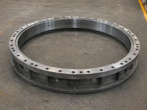 Anillo perimetral metálico fabricado a medida para equipos industriales, chancadores y componentes especiales.