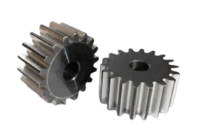 Piñones y engranes mecanizados para reductor industrial, fabricados con tolerancias según requerimiento de acople